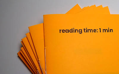 stack of fluo orange books